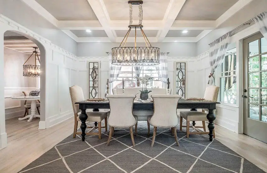 Dining room with white coffered ceiling and gray paint