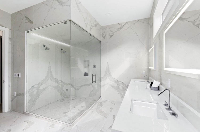 Glass walk in shower with dual vanities