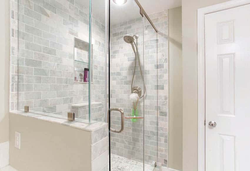 Half wall shower with glass door
