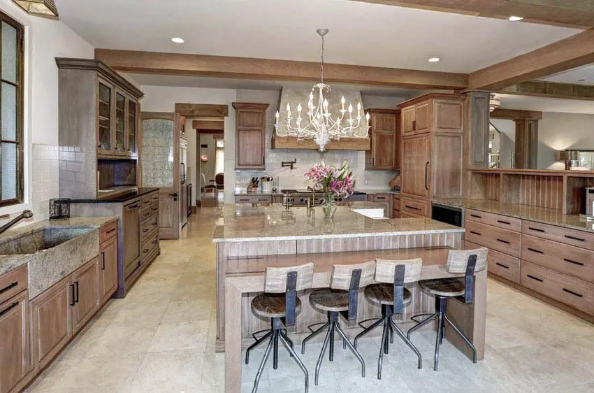 Open concept kitchen with vaulted ceiling and bi-level breakfast bar 