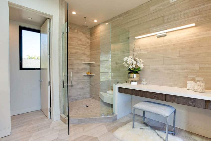 Porcelain tile corner shower with rainfall head and makeup vanity bathroom