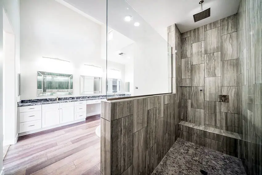 Shower with half wall and half glass divider