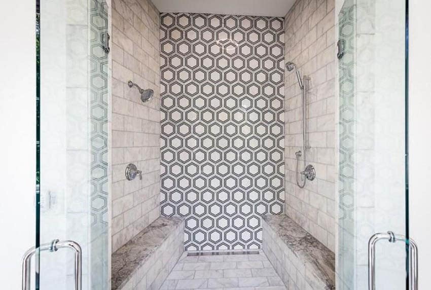 Shower with hexagonal tile and two benches