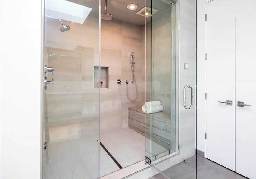 Walk in steam shower with bench