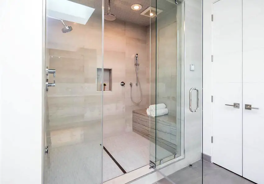 Shower with steam feature and bench