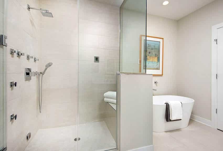 Walk in steam shower with side sprayers and rainfall shower head
