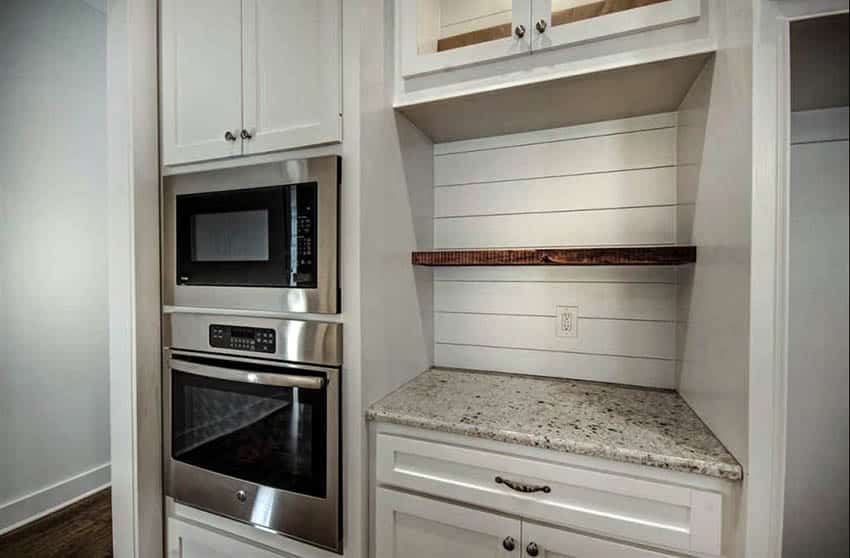 Kitchen with little niche with shiplap accent wall backsplash