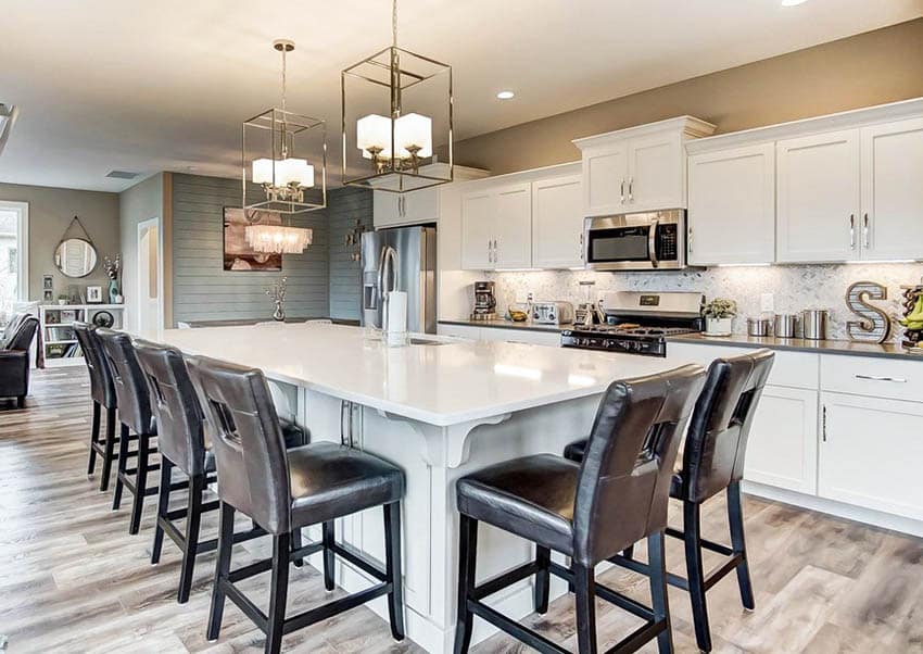 Kitchen with dining nook, eat-in island, white quartz slab countertops