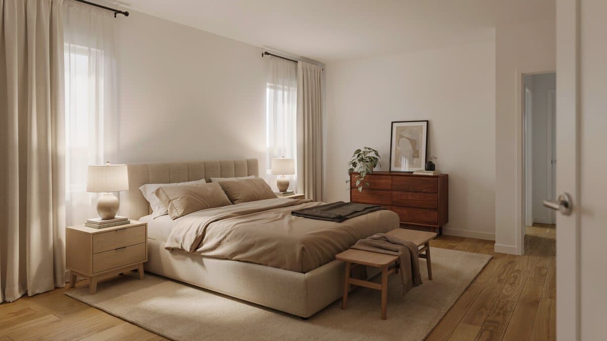 Contemporary master bedroom with hardwood-look laminate flooring and a soft area rug