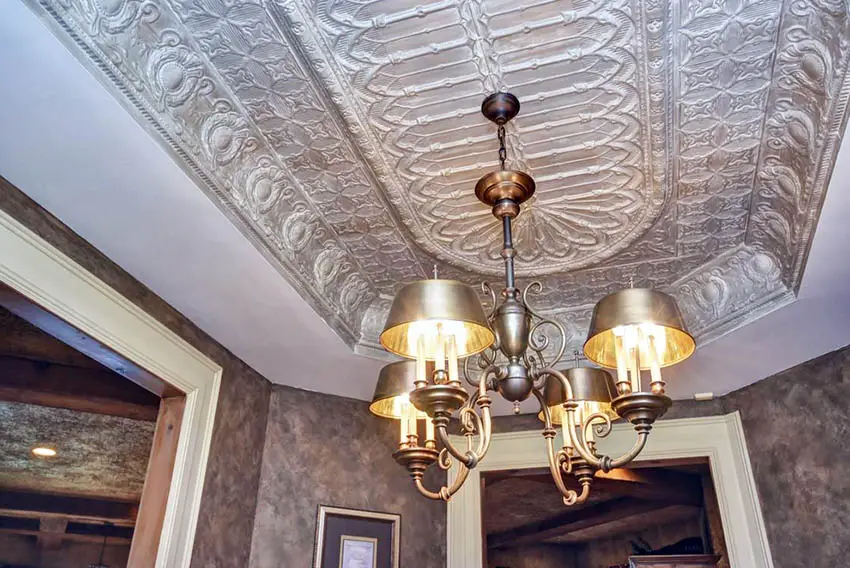 Dining room with tin tray ceiling and chandelier