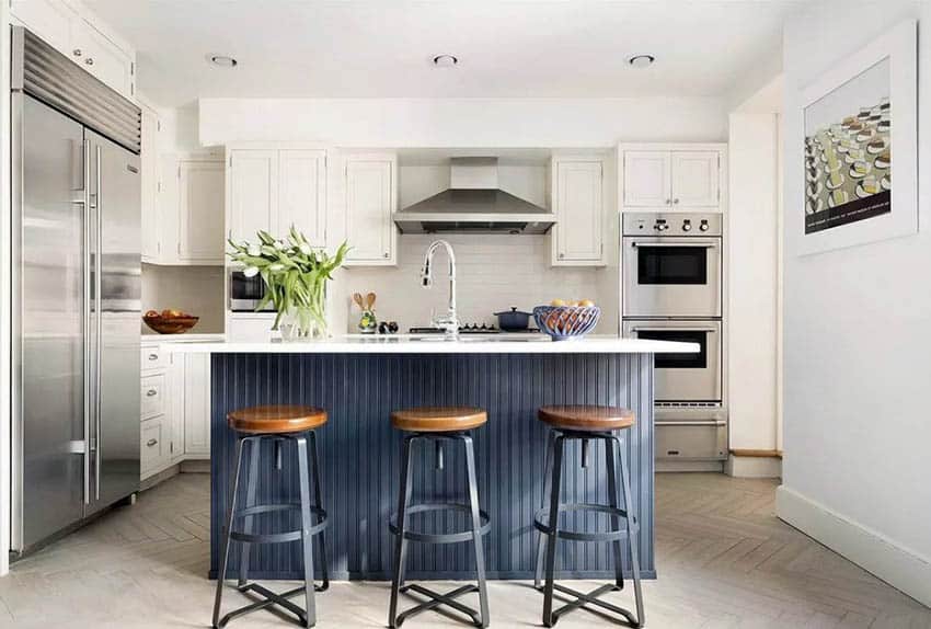 Kitchen with custom island, subway tile backsplash and stools