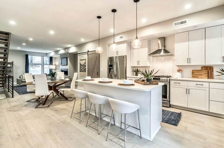 Open Concept Kitchen To Dining Room And Living Room With Wood Flooring 