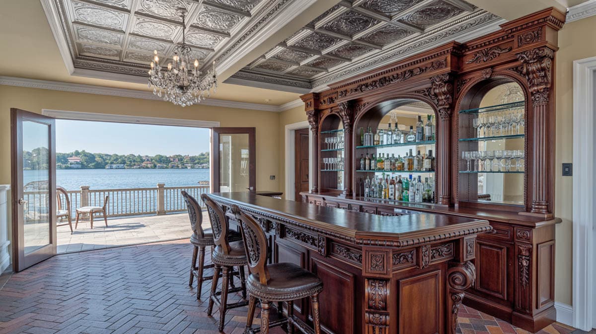 Victorian-inspired bar with a chandelier, ornate carved wood, and upholstered leather stools