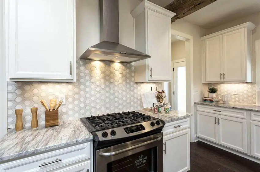 White kitchen with gray quartz countertop