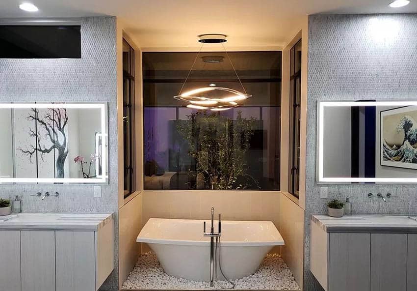 Bathroom with tub white rock surround and modern chandelier with dimmer