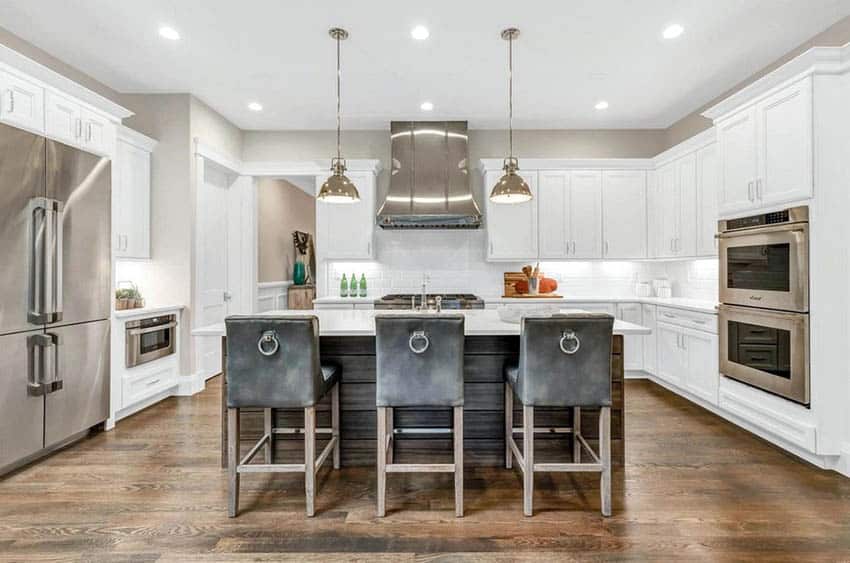 Beautiful kitchen with hidden hinges and wood plank island