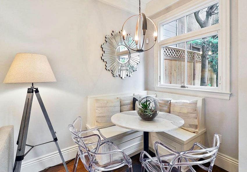 Dining nook with large baseboard molding