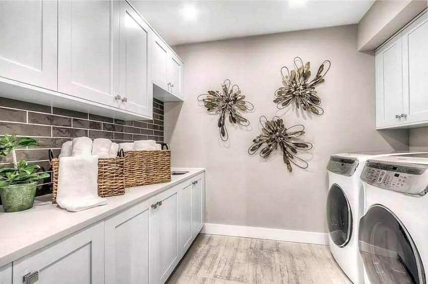 Finished basement with white cabinets wood look tile floor