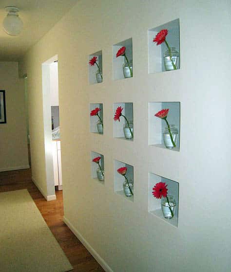 Hallway with prefab wall niche and flowers