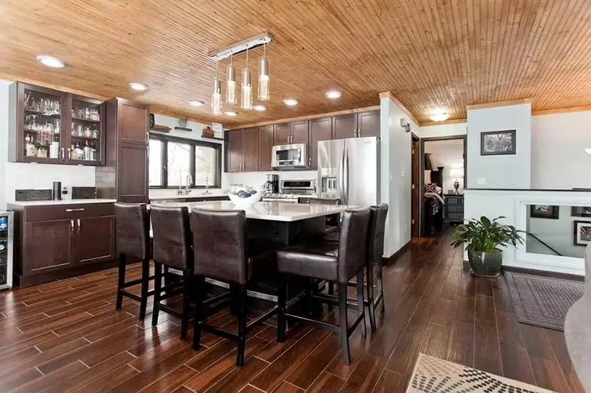 Kitchen with wood tongue and groove ceiling