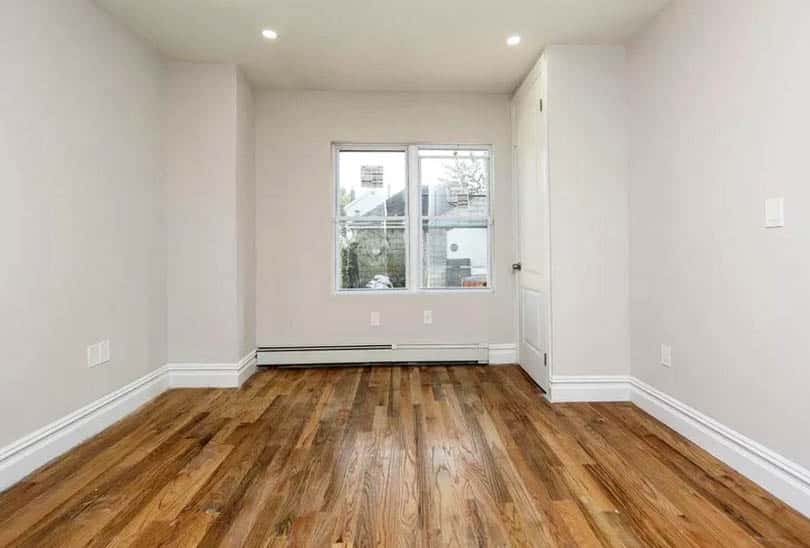 Living room with slant fin heated baseboards