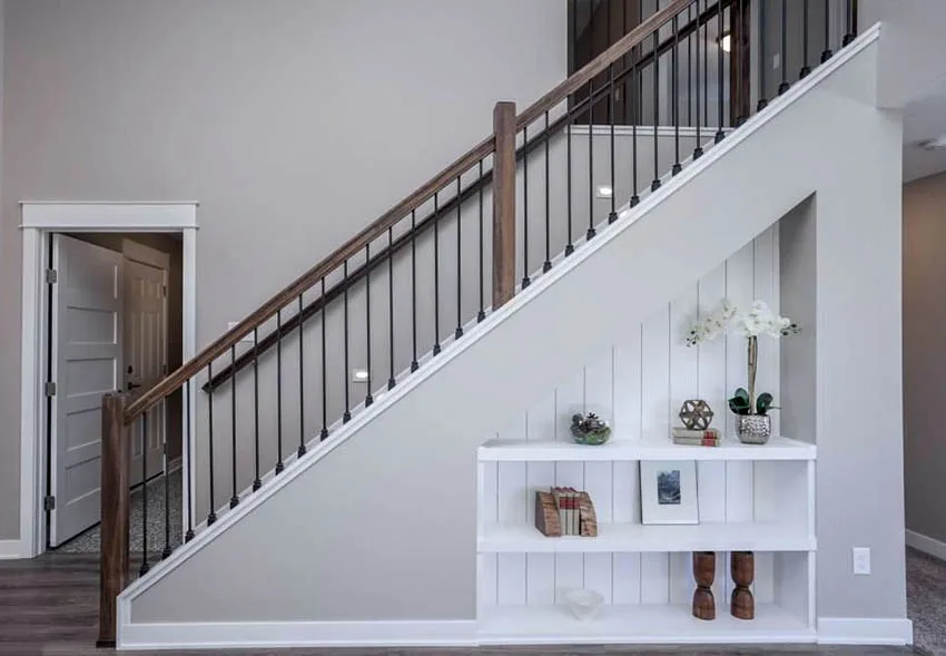 Under stairs niche with shiplap and decor