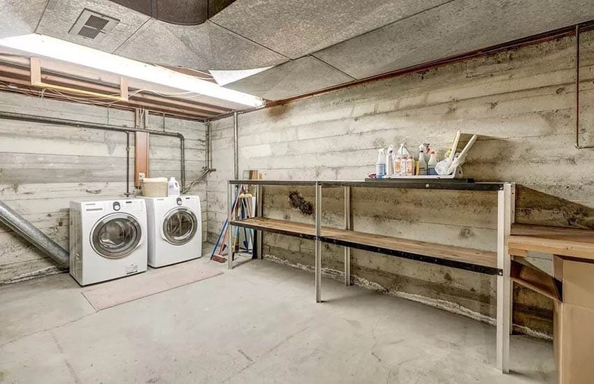 Unfinished basement with laundry