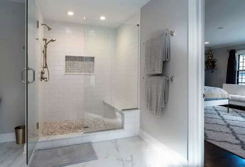 Walk in shower with basket weave tile wall niche