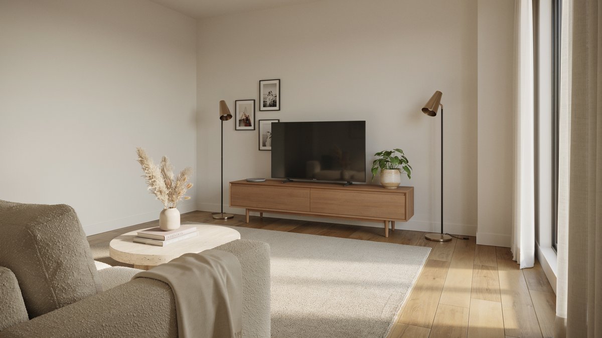 Low wood TV stand flanked by two floor lamps and boucle seating