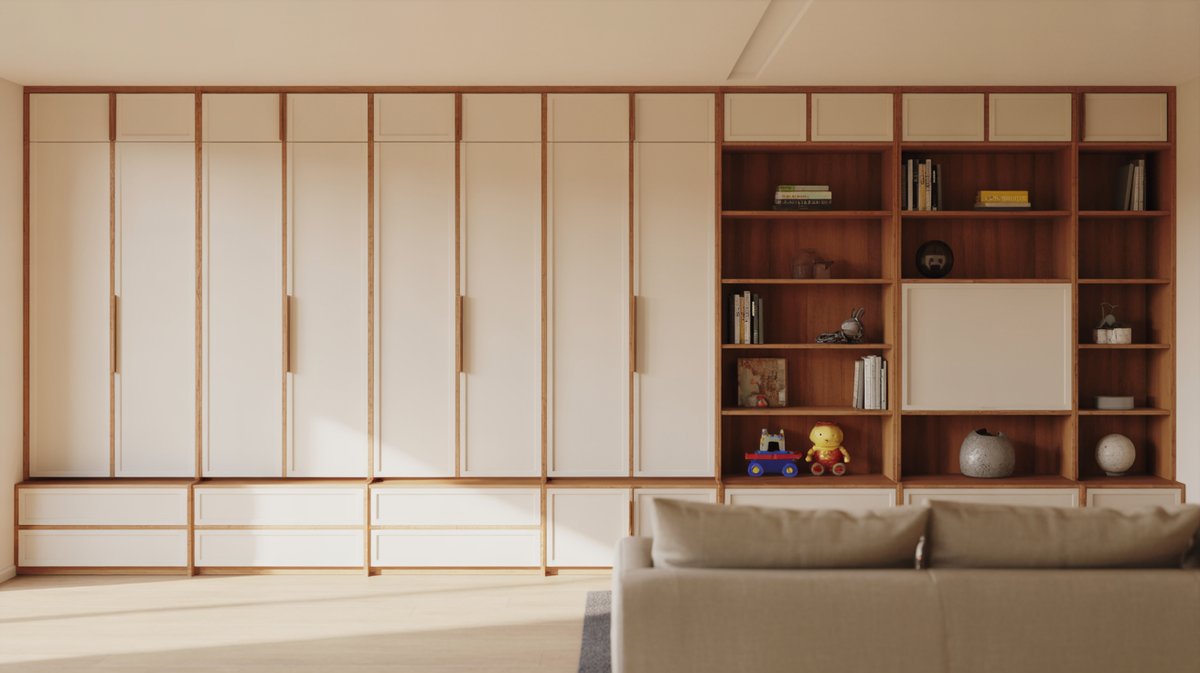 Floor to ceiling cream and walnut built ins with low toy drawers