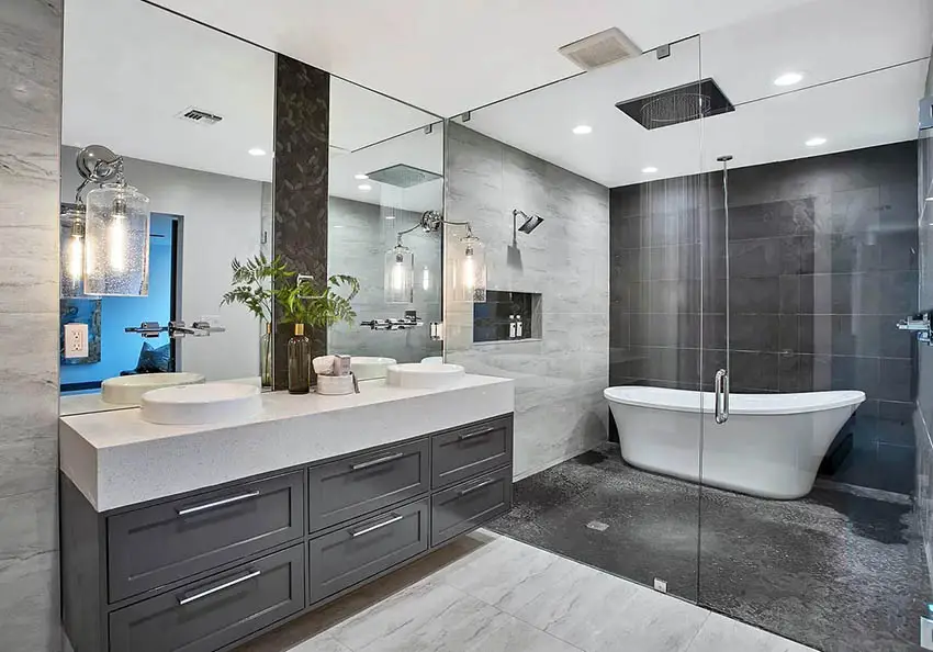 Large bathroom with slipper tub and river rock shower floor