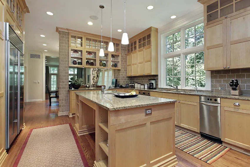 Craftsman kitchen with wood cabinets and granite center island