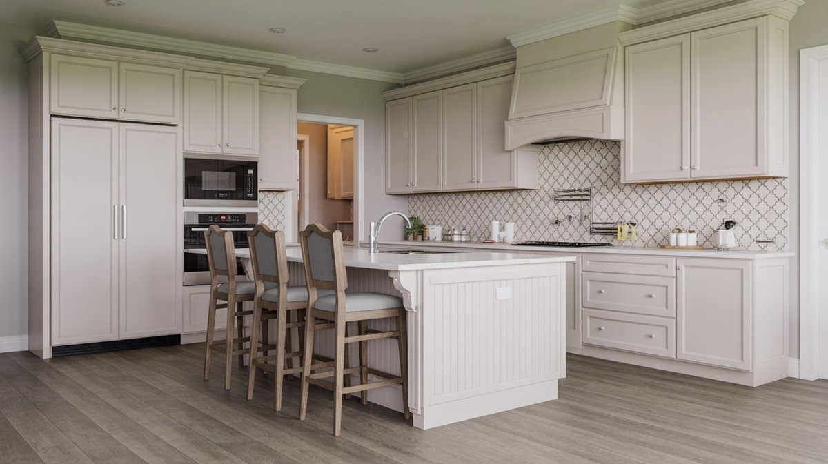 Cream raised-panel kitchen with arabesque tile backsplash, light gray island, and upholstered gray bar stools