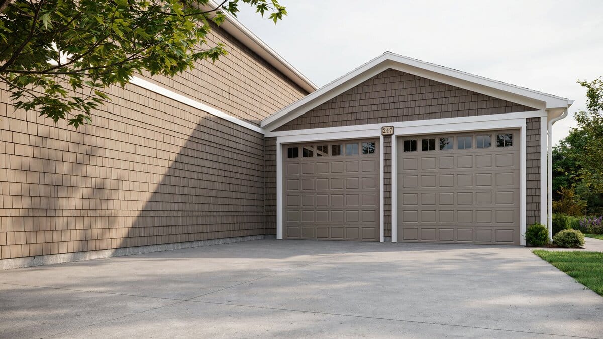 Two taupe doors carrying a row of rectangular windows across the top