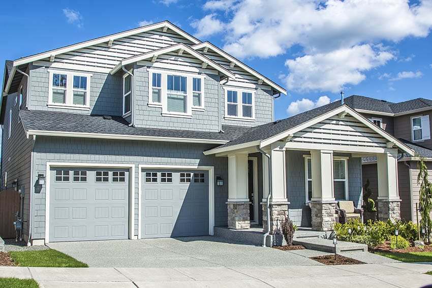 Home with two door carport