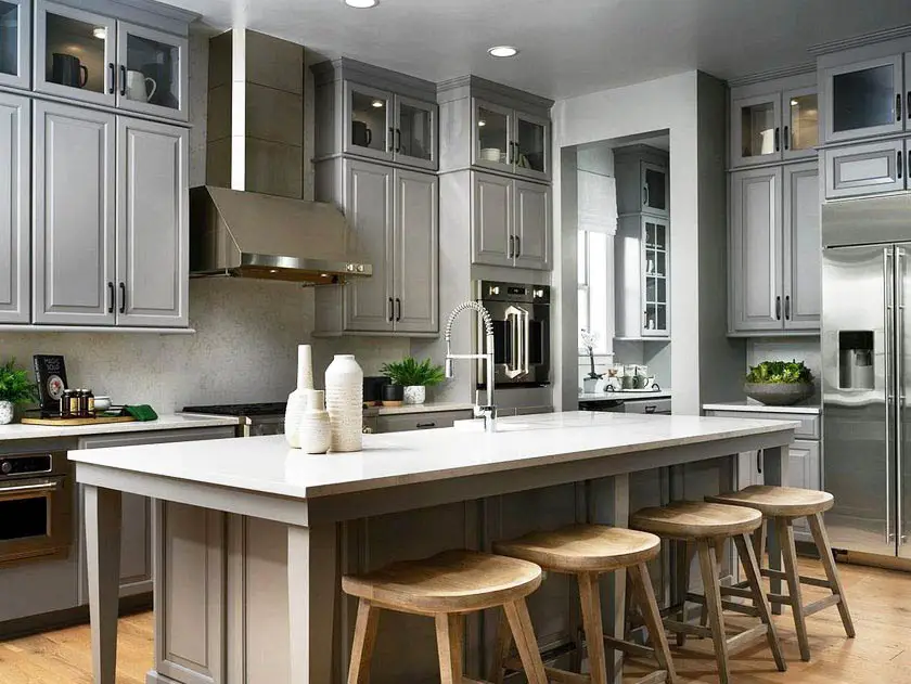 Kitchen with gray raised panel cabinets 