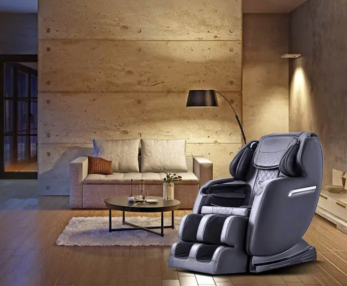 Massage recliner chair, love seat and concrete slab walls