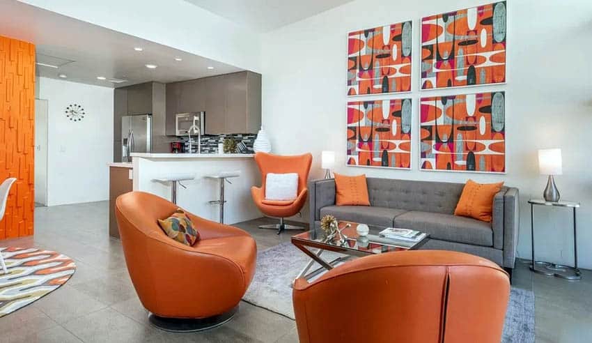 Mid century modern living room with brown and orange furniture concrete floors
