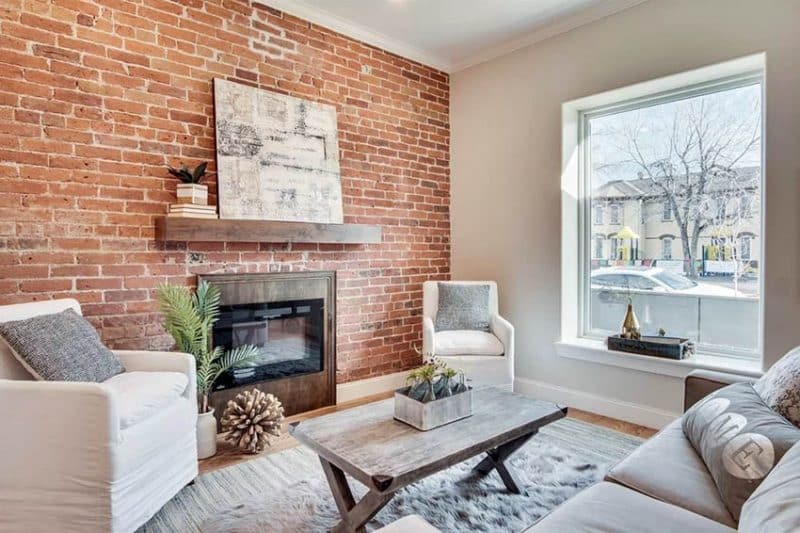 Brick Wall In Living Room With Fireplace