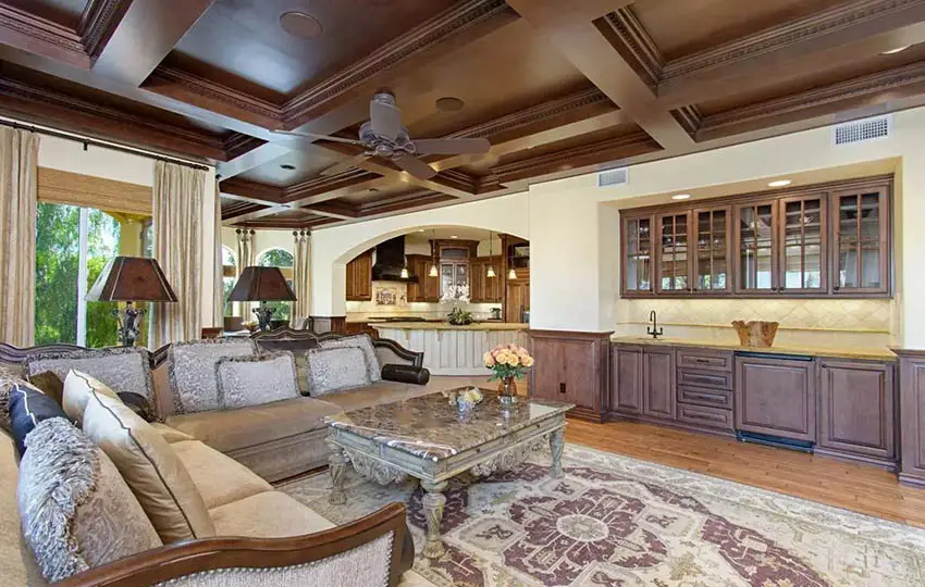 Rustic room with vaulted ceiling and plush cushions in warm brown shades