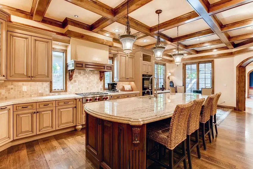 Traditional kitchen with beige cabinets and brown countertops