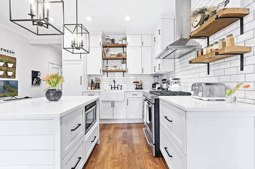 Kitchen with open shelving, white cabinets, white quartz countertops