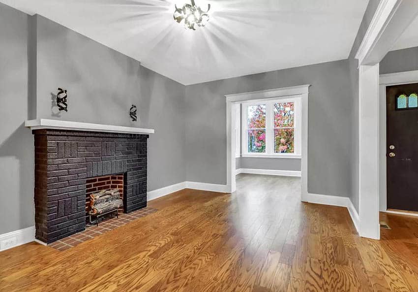 living room black brick fireplace