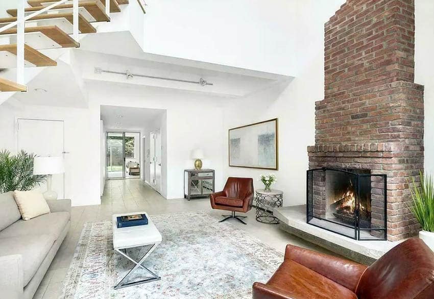 Contemporary living room with brick fireplace
