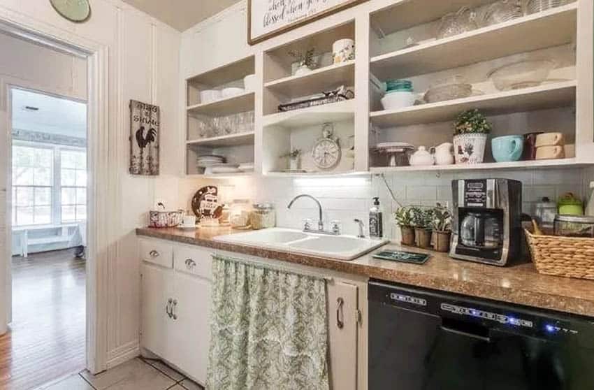 Country kitchen with open shelving white subway tile backsplash
