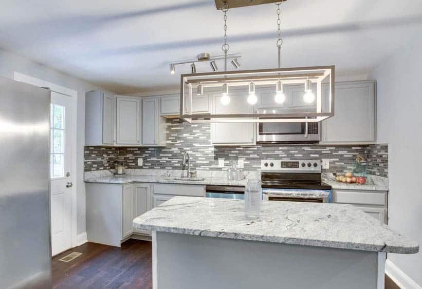 Kitchen design with 4 inch granite backsplash