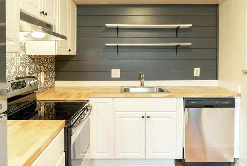 Kitchen with shiplap walls and diy open shelving