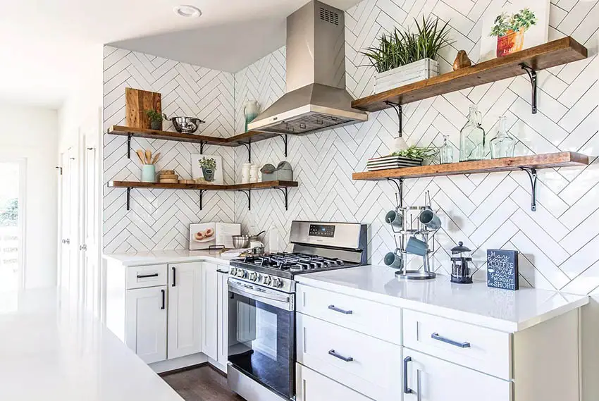 Kitchen with herringbone tile backsplash and solid surface counters
