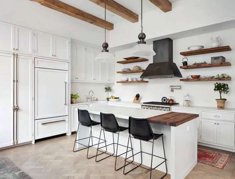 Kitchen with wood open shelves and white cabinets