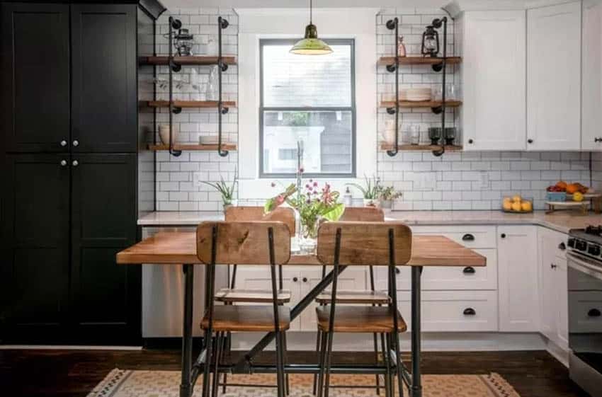 Small kitchen with industrial open shelving and wood table